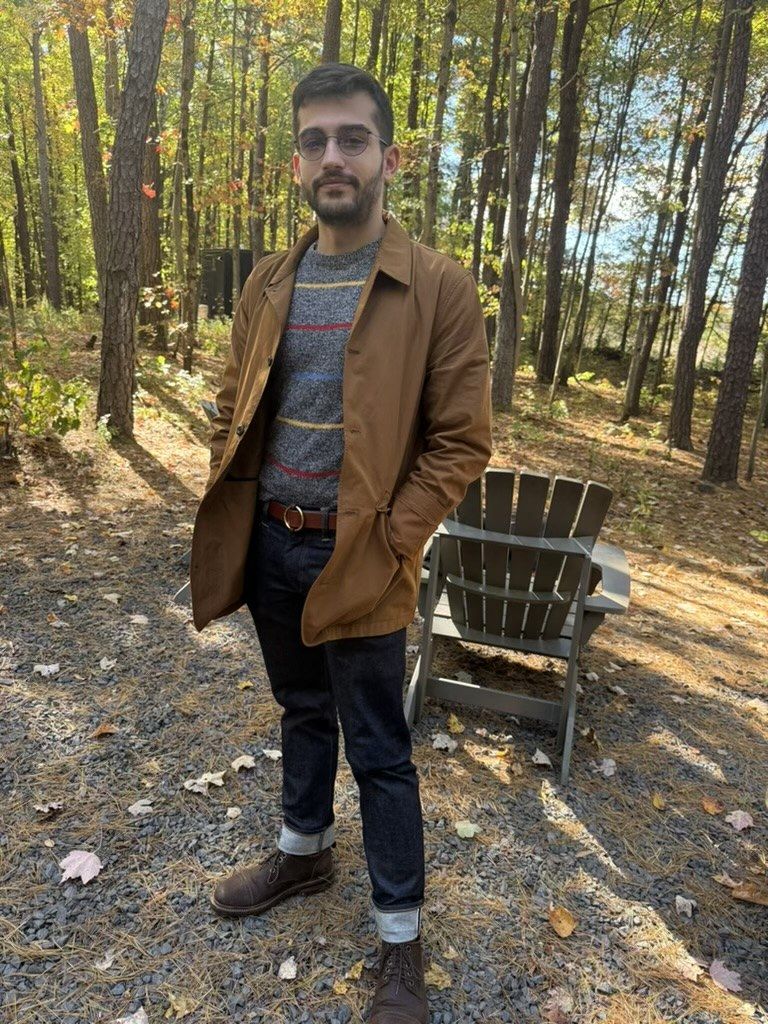 Nick in an autumn trench and striped knit
